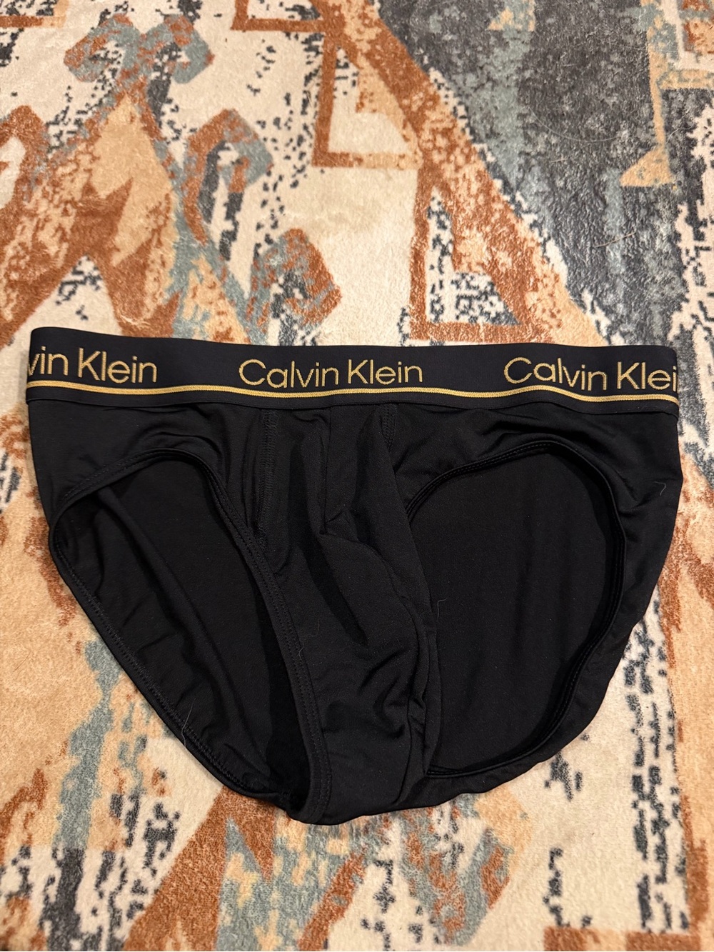 Calvin Klein Black Briefs with Gold Logo Waistband